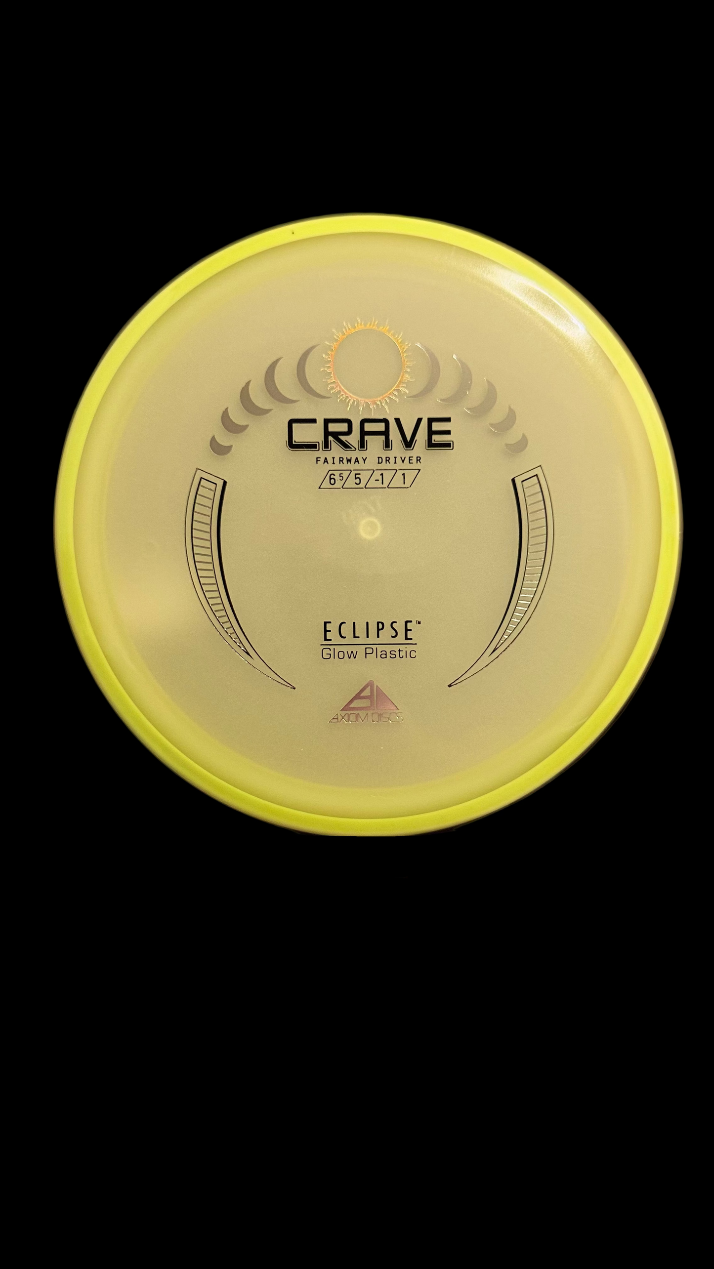 Axiom Eclipse Glow Crave fairway driver with bright yellow rim and glowing off-white center — disc golf driver with flight numbers 6.5 | 5 | -1 | 1.