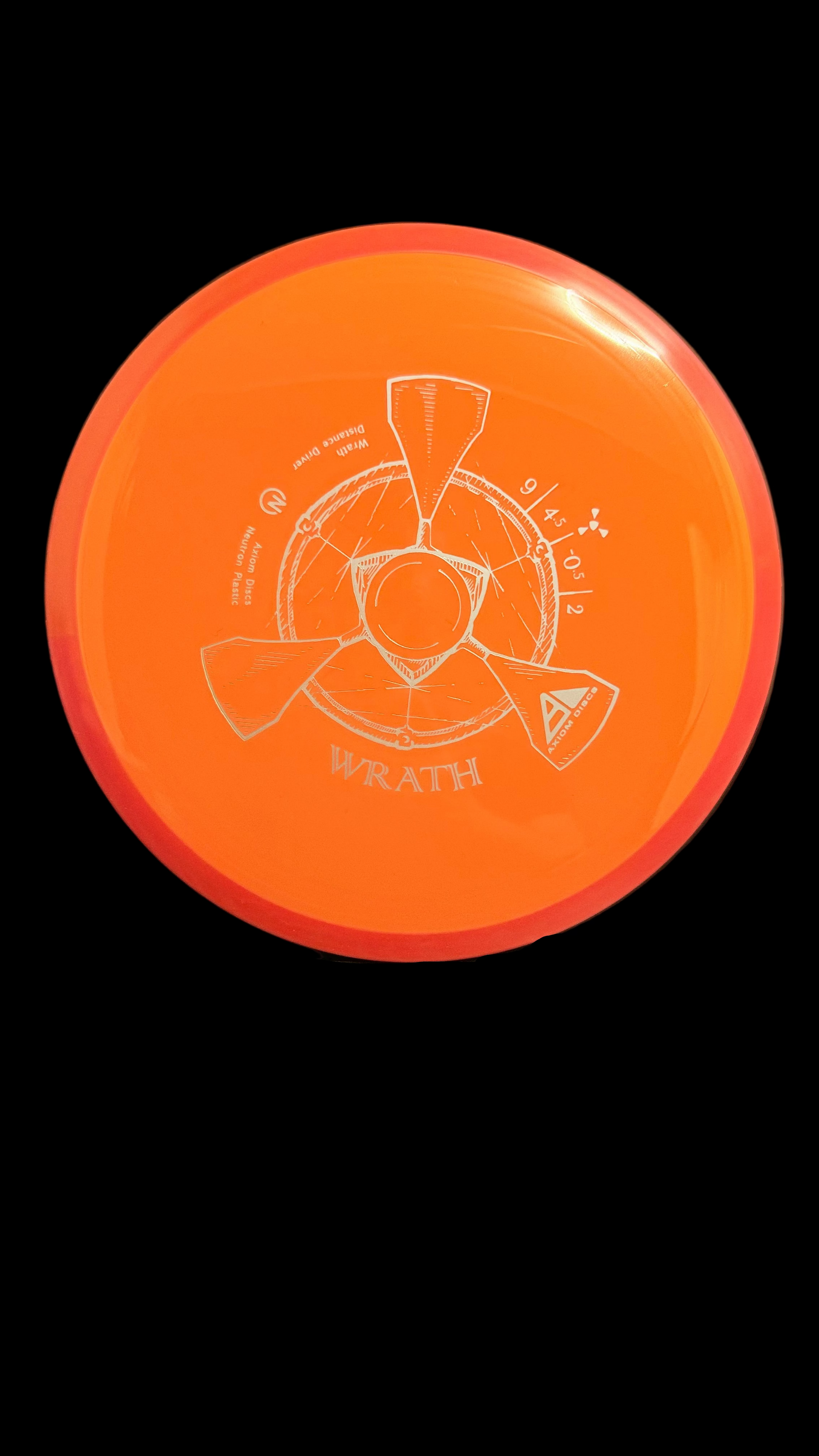 Axiom Neutron Wrath orange distance driver with red rim and white stamp on a display stand