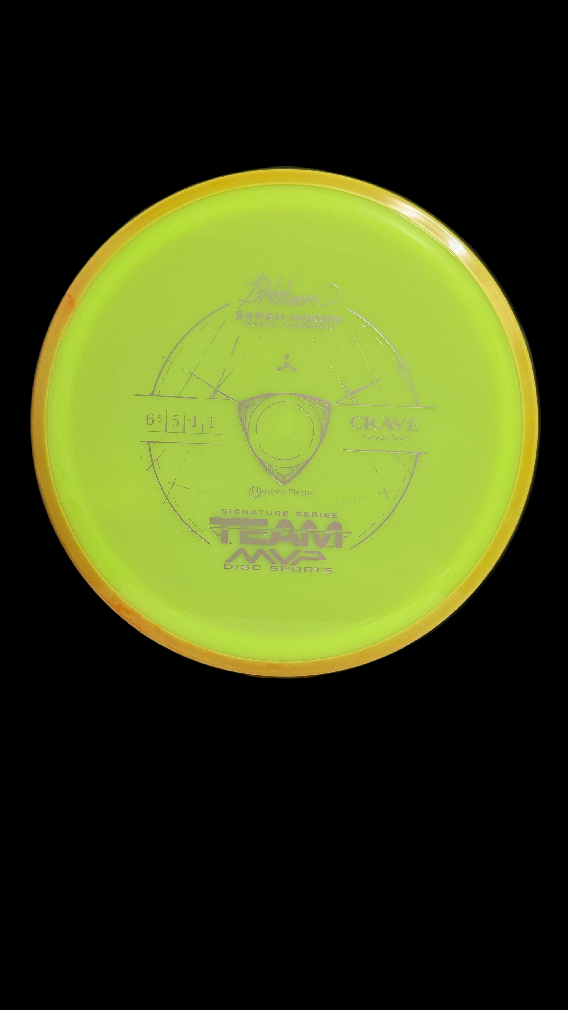 Axiom Proton Crave Sarah Hokom Signature Series disc golf fairway driver, neon yellow core with orange rim, flight numbers 6 5 -1 1