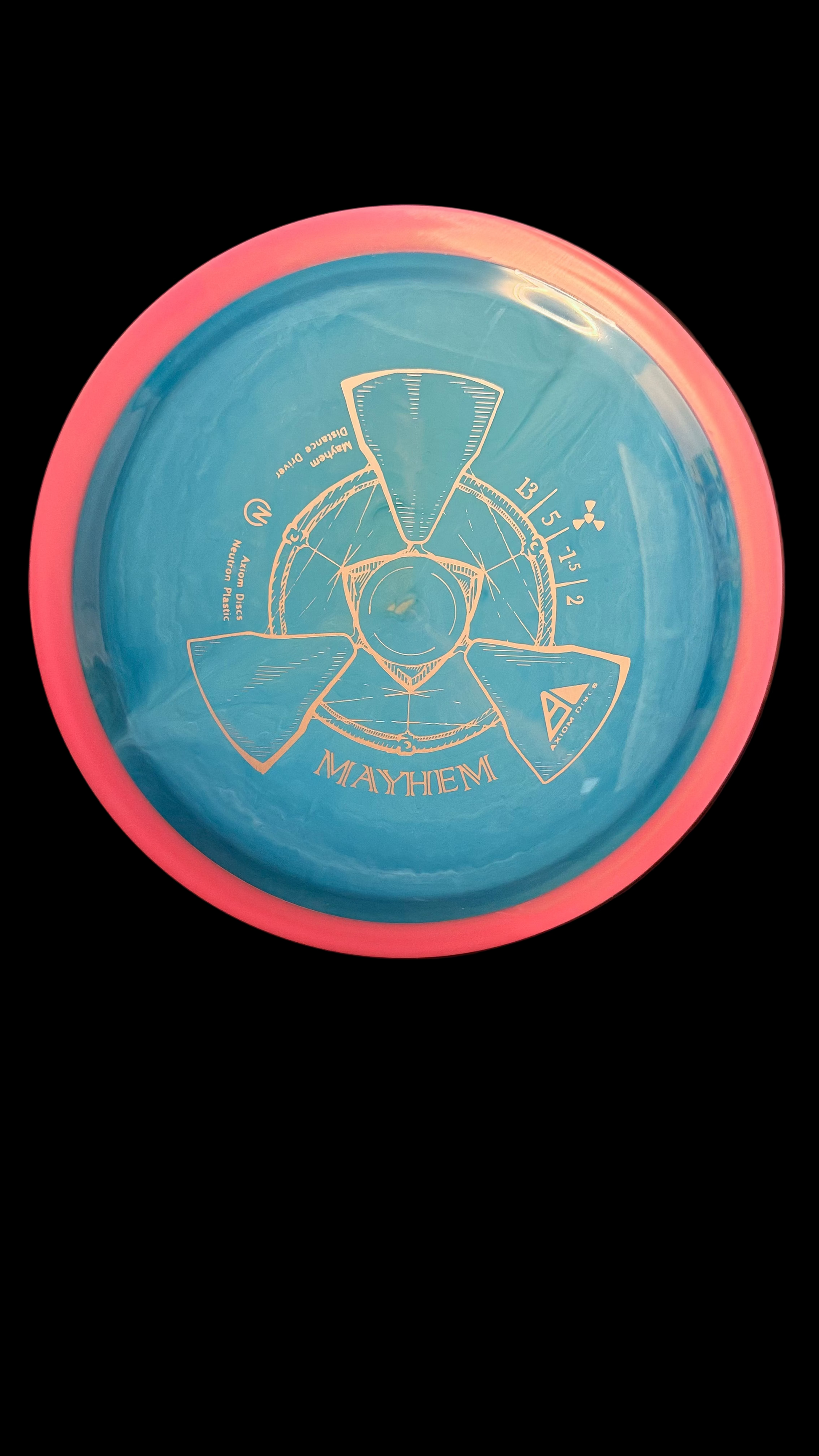 Blue Axiom Neutron Mayhem distance driver with pink overmold, featuring white tri-blade stamp and flight numbers 13 | 5 | -1.5 | 2, displayed on a stand against a dark background.