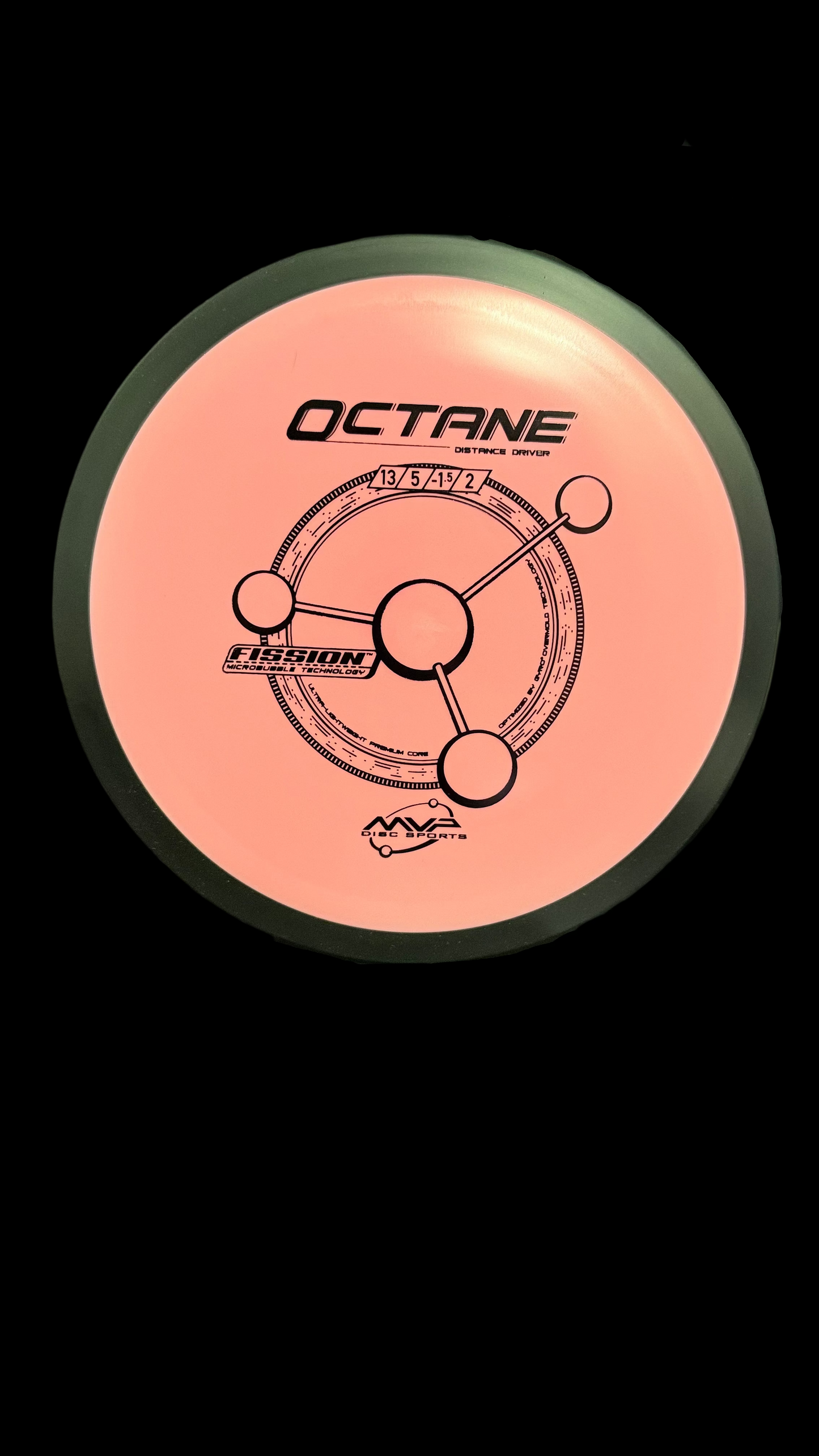 MVP Fission Octane distance driver in pink with dark brown rim, featuring the Octane flight chart and Fission technology stamp (13 | 5 | -1.5 | 2), displayed upright on a Zens stand.”