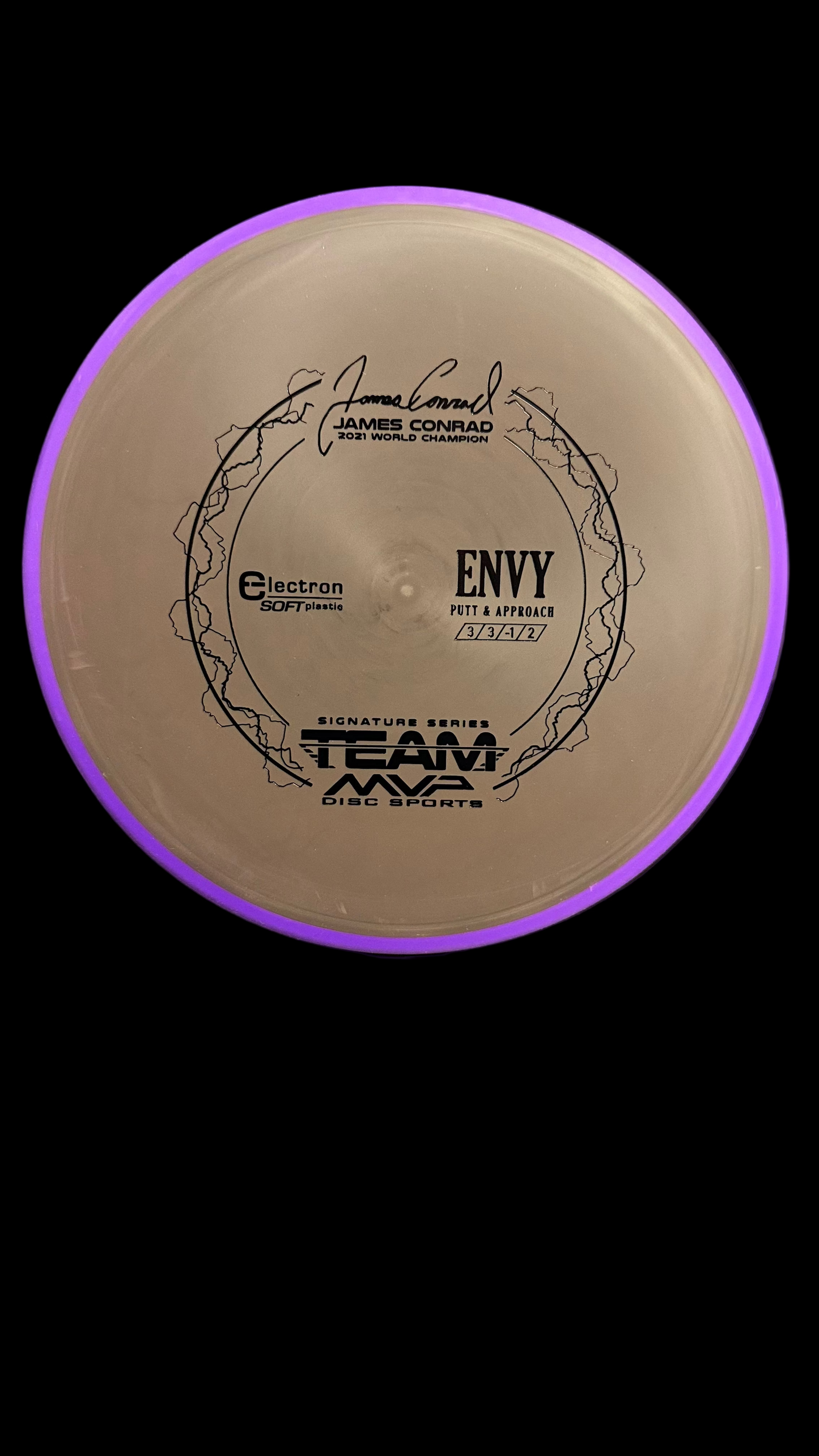 Axiom Electron Envy Soft James Conrad Signature Series putter with a beige center and purple rim.