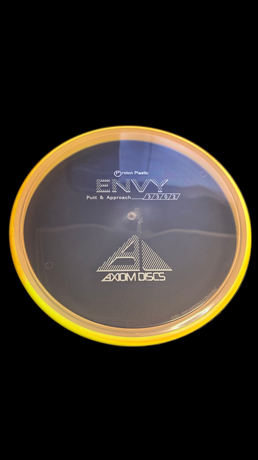 Axiom Electron Envy putter disc in translucent smoke gray with bright yellow rim, top view showing flight ratings 3|3|0|2 and Axiom Discs logo
