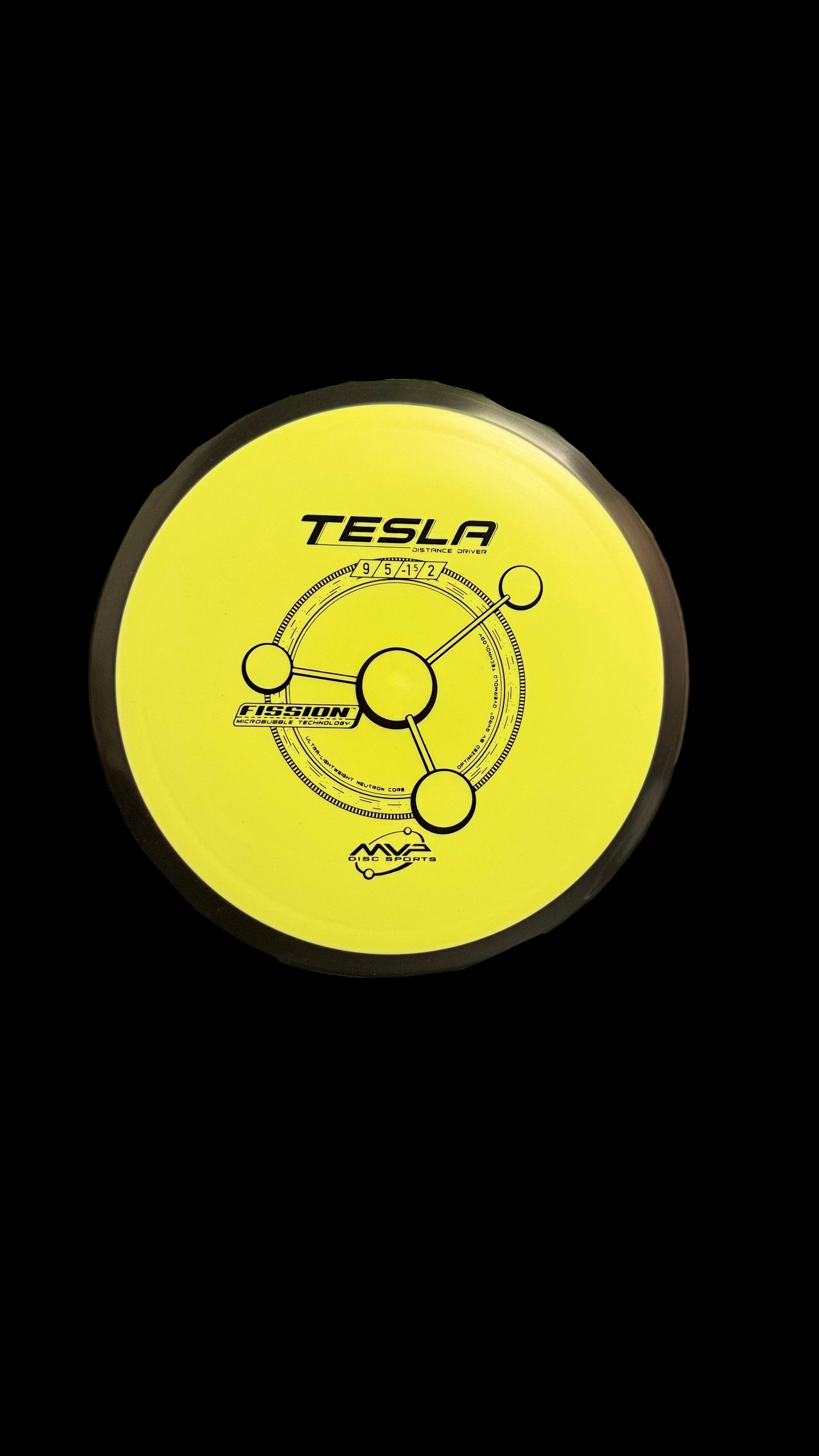 A light-yellow MVP Fission Tesla distance driver with a dark rim and the Fission orbital stamp, showing flight numbers 9 | 5 | -1 | 2 on a display stand.