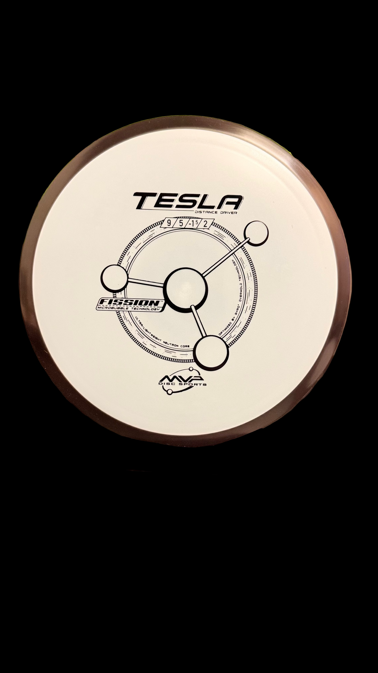 A silver MVP Fission Tesla distance driver with a grey rim, displaying the Fission orbital stamp and flight numbers 9 | 5 | -1 | 2 on a stand.