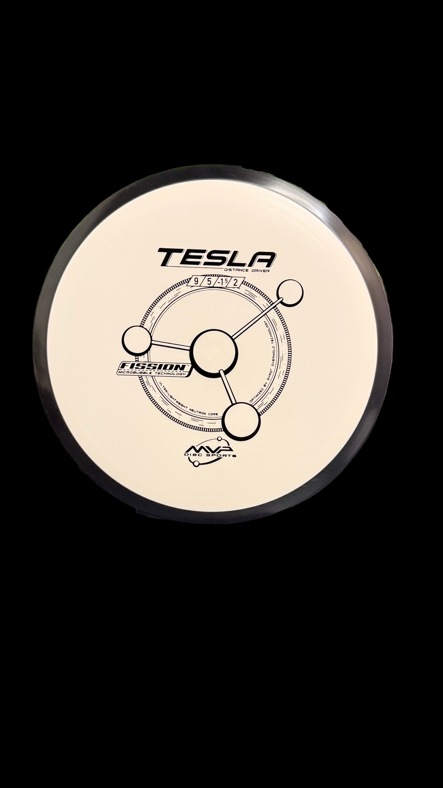A white MVP Fission Tesla distance driver with a black rim, featuring the Tesla orbital stamp and flight numbers 9 | 5 | -1 | 2 displayed on a stand.